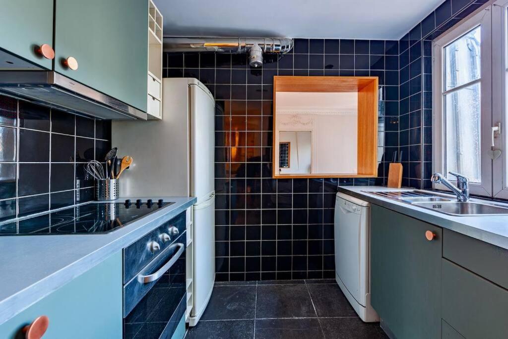 Charmant Appartement Au Coeur De Paris Exterior foto